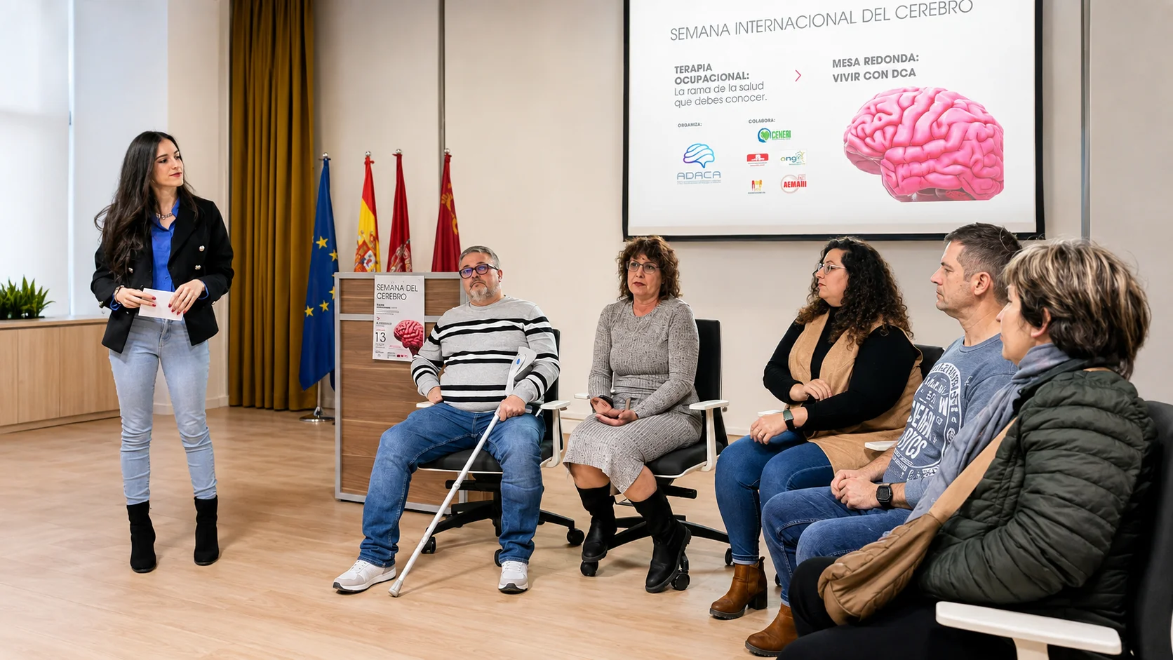 Personas participando en una charla sobre terapia ocupacional y daño cerebral adquirido organizada por ADACA.